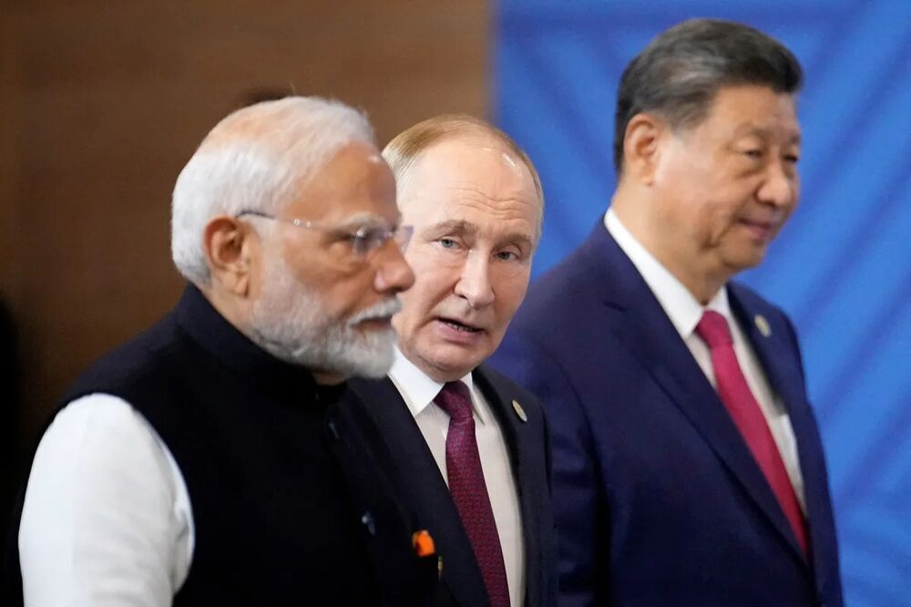 Narendra Modi, Vladimir Putin e Xi Jinping em Kazan, na Rússia (Foto: Alexander Zemlianichenko/Pool via Reuters).